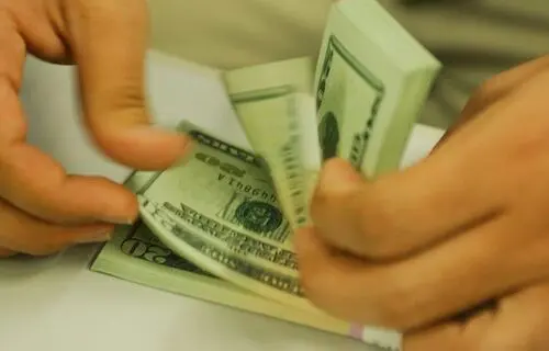 Dólar: moeda custa R$ 5,12